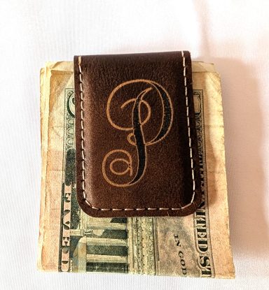 Rawhide magnetic money clip with gold engraving. This item can be engraved on both sides.