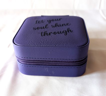 Jewelry box zips closed to secure your belongings.