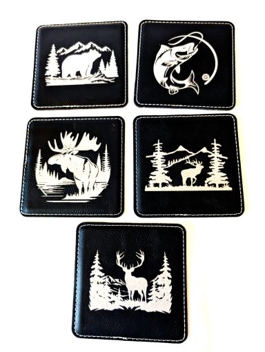 Black leatherette coasters with silver of gold engraving. This is the Montana Outdoorsman theme.