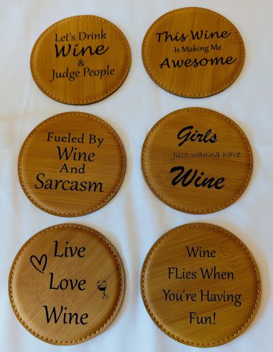 Leatherette coasters in bamboo color with the wine lover's theme